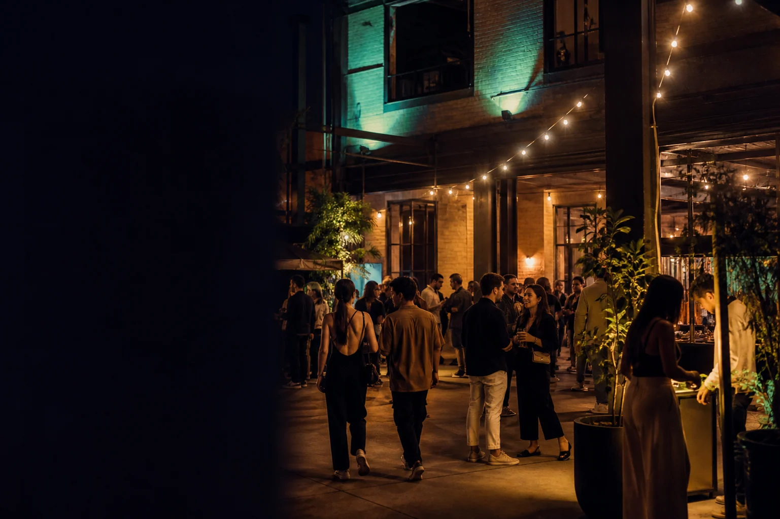 Guests exploring a lively evening market